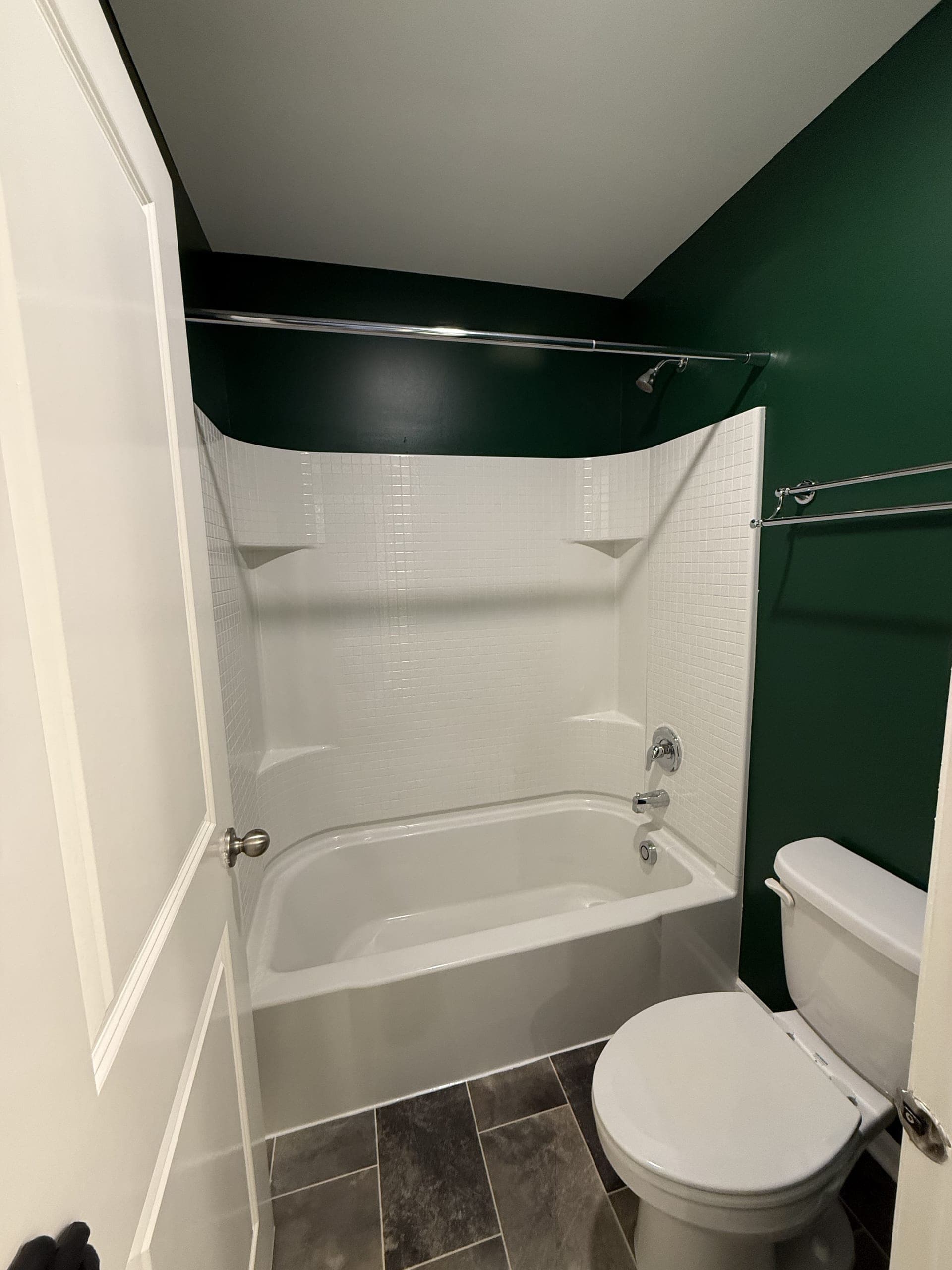 Bathtub and shower scrubbed clean by DSM Cleaning Solutions in Plainfield IL